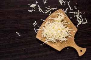 The Sizzle of Shredded Cheese on Sandwiches